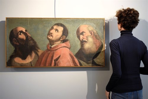 Volti di Santi in atteggiamento ieratico.